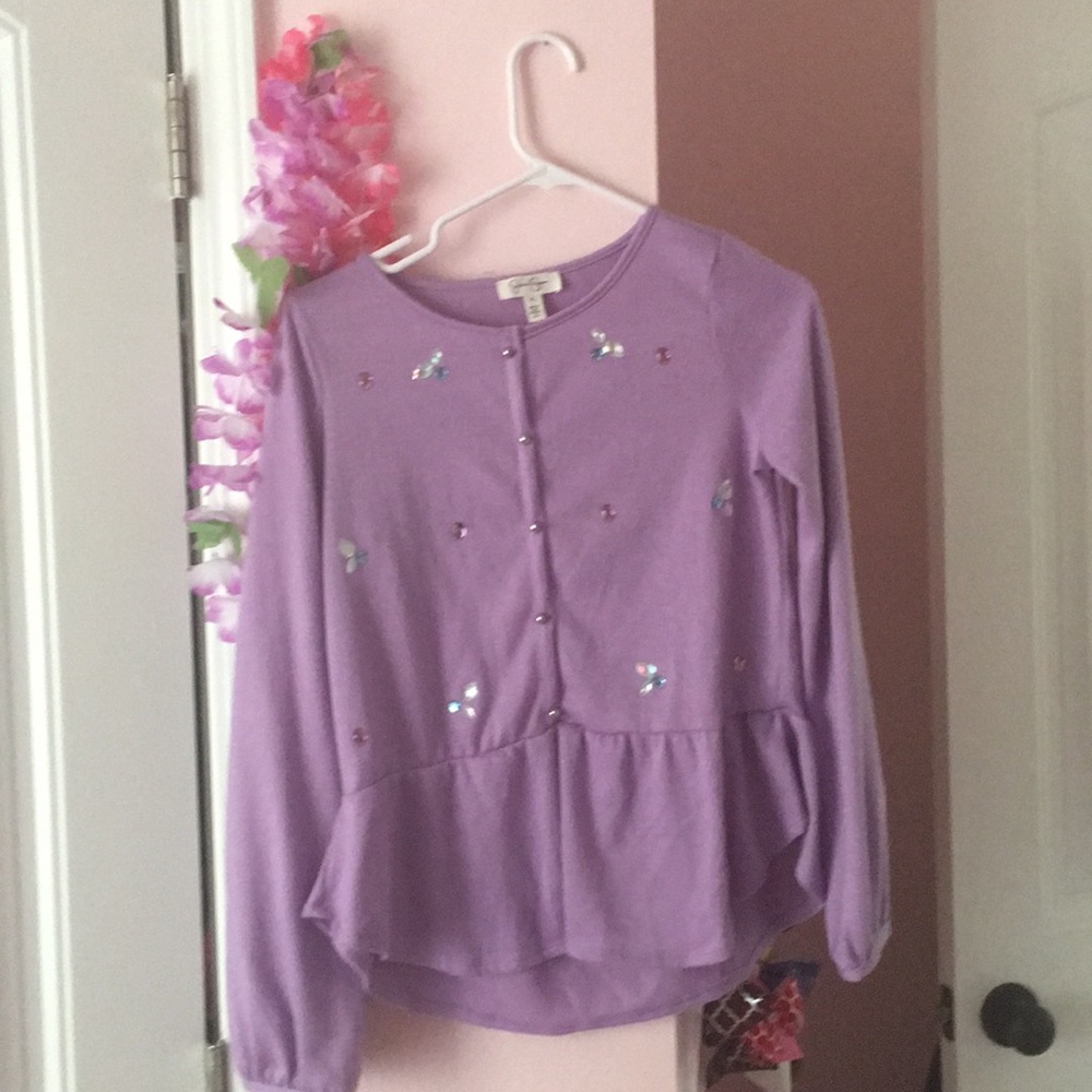 A Jessica Simpson purple sweater